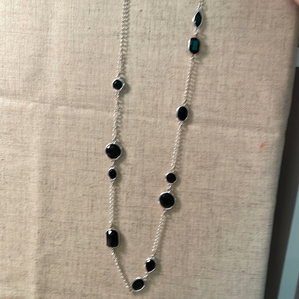 Adjustable long statement necklace.